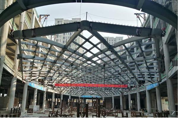 卓伯根商业综合体项目大跨度双曲面钢网壳顺利完成主体结构施工